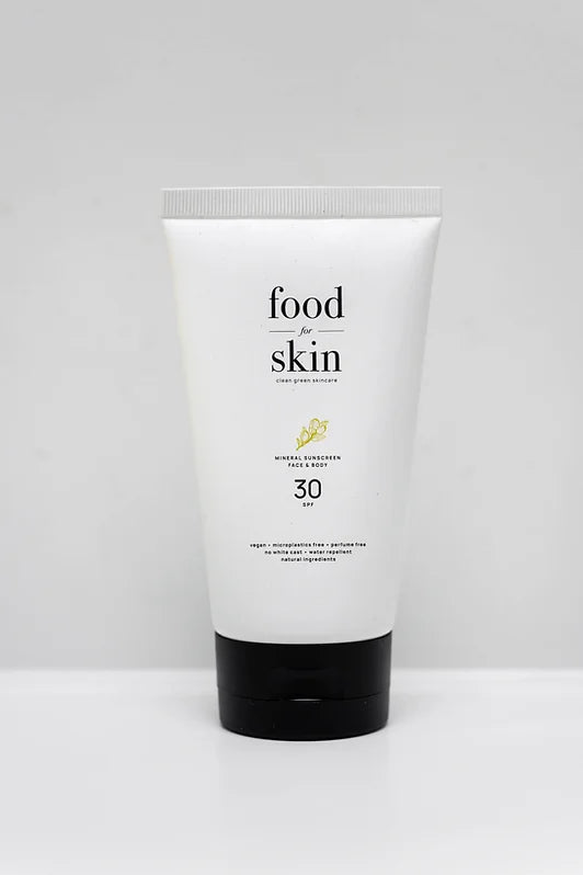 100% natuurlijke zonnebrand crème van Food for Skin. Vegan en Koraalvriendelijk.