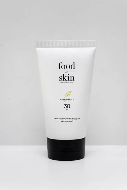 100% natuurlijke zonnebrand crème van Food for Skin. Vegan en Koraalvriendelijk.